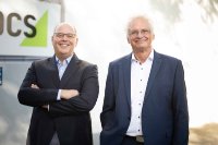 Die PCS Geschäftsführer Ulrich Kastner-Jung (links) und Walter Elsner (rechts) blicken gemeinsam auf ein Rekordjahr und eine klare strategische Ausrichtung in Richtung digitale Services und Nachhaltigkeit.